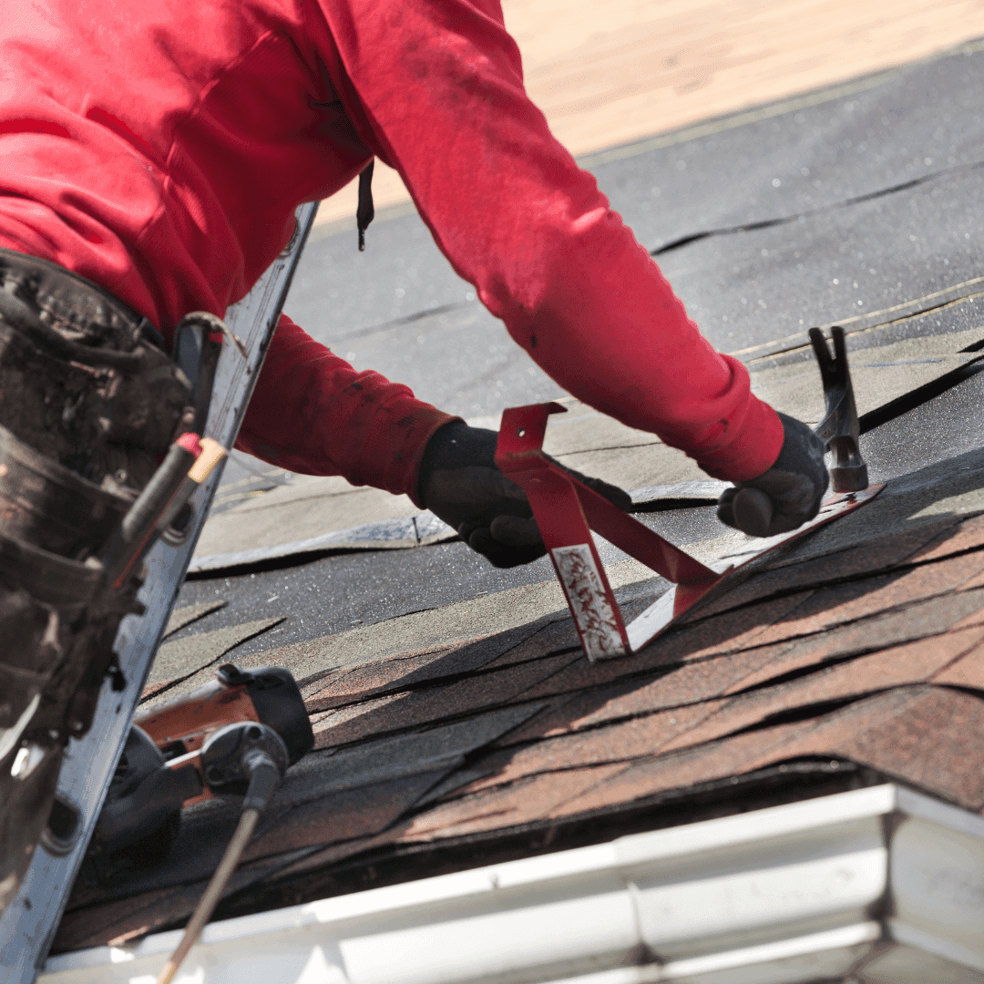 Roofer repairing a roof